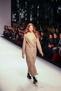 Model wears full length coat