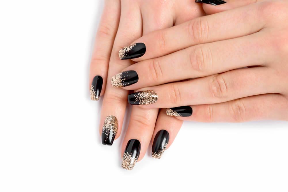 black and gold ombre nail design