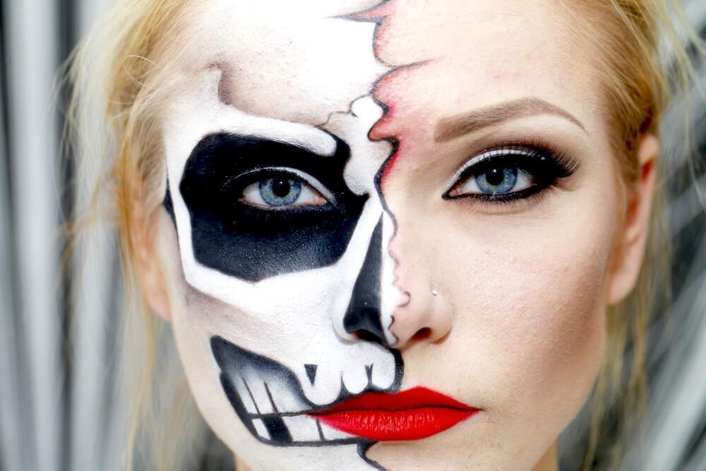 Young unidentified woman with scary skull makeup