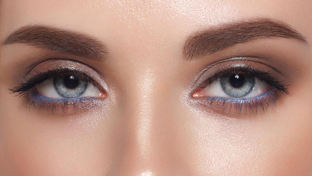 Closeup of woman's eyes with light makeup