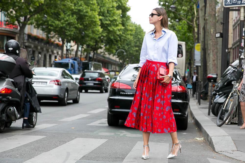 Woman in printed skirt on street