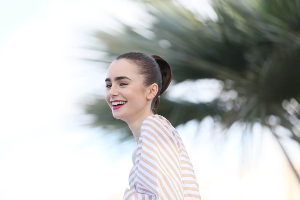 Lily Collins smiling