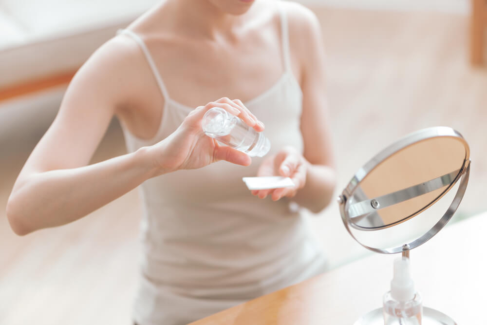 woman using toner